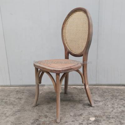 China Vintage Stackable Chair Style Hotel Chair Rustic Cane Round Back Banquet Dining Chair for sale