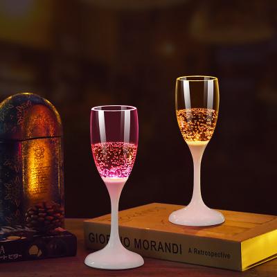 China Active LED Liquid Champagne Glass Bridal Shower Party Supplies Led Flashing Plastic Wine Glass Eco Friendly Acrylic Glass Cups Champagne Flutes Drinkware for sale