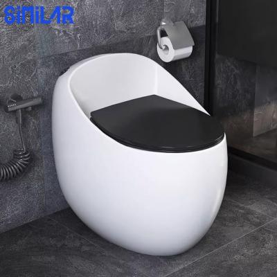 China Dual-Flush SIMILAR Egg Shaped Toilet Floor Mounted Bathroom Closestool for sale