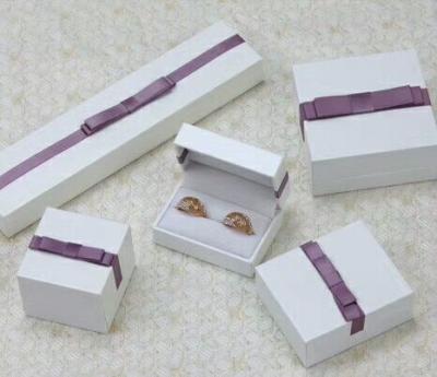 China Fashion PU Paper Plastic Jewelry Gift Box With Bow Customized for sale