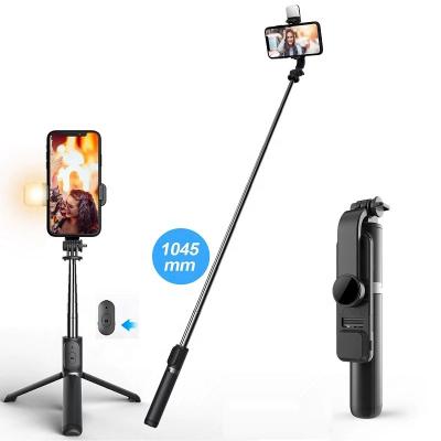 China Q02S Mobile Phone Selfie Stick Tripod With Retractable Fill Light 1045mm With BT 360 Rotate Wireless Remote Phone Camera Holder Stand for sale