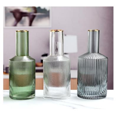 China Transitional Style Luxury Bottle Shape Clear Glass Vase Home Decoration For Living Room Flower Bottle Glass Vase For Wedding for sale