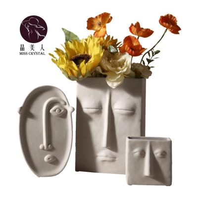 China Art Ceramic Vases Ornaments Handicraft Modern Minimalist Nordic Style Human Face Vase Living Room Flower Vase for sale