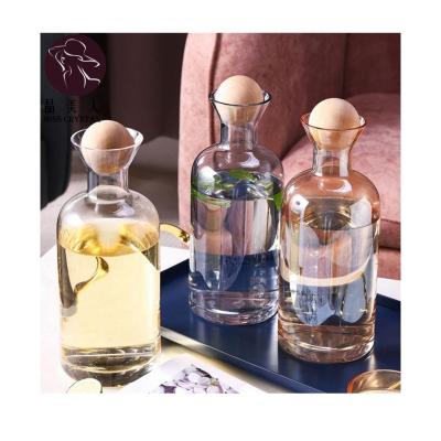 China Viable Nordic Style Glass Decanter Water Pitcher With Wooden Lid Beverage Tea Jug Waterkoker Household Drinkware Clear Cold Water Bottle for sale