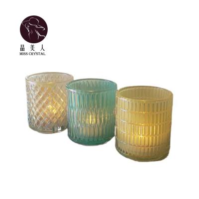 China Morden Design Simple Embossed Glass Candle Jar For Romantic Candlelight Dinner Candle Jar For Wedding for sale