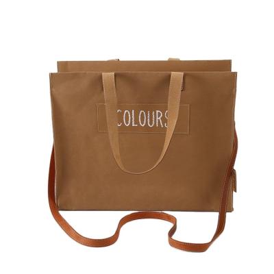 China Reusable Letter Handled Tote Bag Accept Customized Logo BSCI Factory Light Shopping Packaging Eco-friendly Strong Washable Bag Durable Paper for sale