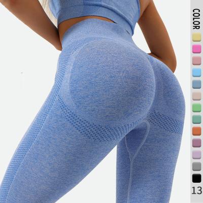 China Hot Selling Honey Peach Seamless Hip Yoga Pants Breathable Small Lifts Women's High Waist Honey Peach Fitness Lifting Tight Pants for sale