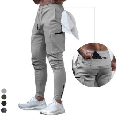 China Anti-wrinkle sports wear workout gym clothing men track jogger pants with pocket for sale