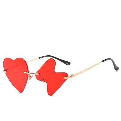 China Fashionable Metal Sun Glasses Men's Fashionable Metal Sun Glasses Heart Trend Eyewear Trade Design Rimless Personalized Asymmetric Luxury High Level Sunglasses for sale