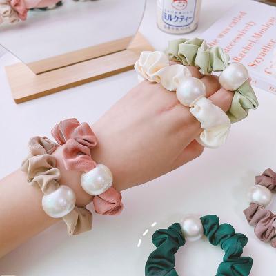 China Fashionable Retro Large French Hair Rope Women's Hair Accessories Temperament Ring Ball Head Rope Simple Silk Ponytail Pearl Hair for sale