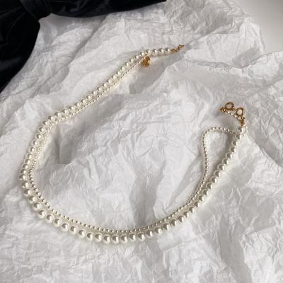 China 2022 new fashion TRENDY double-layers wearing the top pearl necklace women's temperament clavicle chain necklace for sale