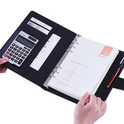 China Embossed Printed Customized Colors Classic Multi-Functional Logo Business Notebook Binder with Calculator for sale