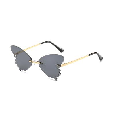 China Fashion Sunglasses Kenbo Style New Personalized Colorful Butterfly Sun Fashion Rimless Glass Small Ladies Party Sunglasses for sale