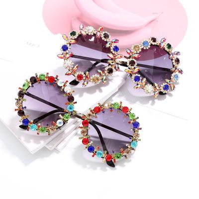 China Fashion Sunglasses 2021 Circule Trendy Oversized Frame Colorful Sunglasses Shape Big Diamond Sun Glasses For Women for sale