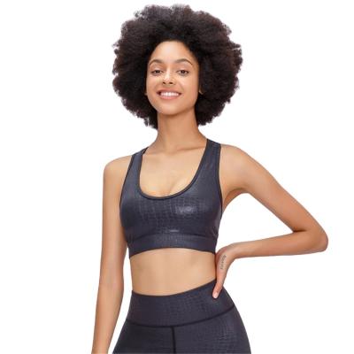 China Women Gym Fitness Bra Breathable U Neck Embossing Shiny Sports Bra Hollowout High Impact Back Sports Bra for sale