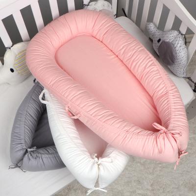 China 2021 Wahsable 2021 Newborn Nest Bed Cotton Solid Color Baby Detachable Baby Hutch for sale