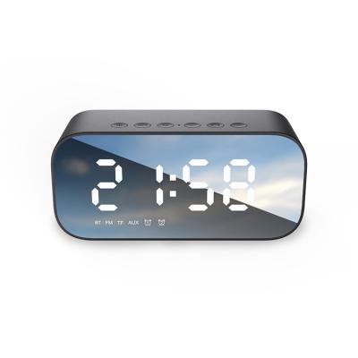 China LED Display Temperature Sensing Double Alarm Clock Bedside Cabinet Table Mirror Wireless Speaker Desk Full-screen FM Radio for sale