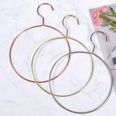 China New Arrival Wholesale Metal Gold Tie Bow Tie Scarf Hanging Rack Multifunctional Ring Hook Storage Hanger Household Round Clothes for sale