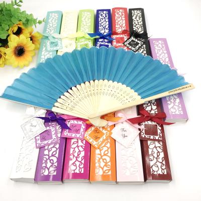 China Wedding Favors Customized Luxurious Hand Fan Fold In Text Elegant Wedding Silk Screen Printing Folding Gift Box Laser-Cut Fans for sale