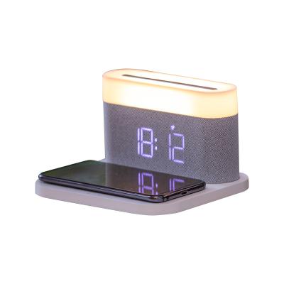 China Universal Mobile Phone LED Desk Lamp Qi Wireless Charger With Night Light Mobile Phone Radio Charging Charger With Alarm Clock for sale