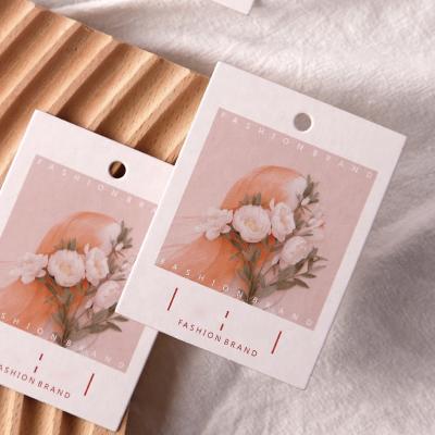 China Fancy Die Cut Customized Viable Matt Paper Jewelry Hang Tags Packaging Premium Hang Tag For Apparel for sale