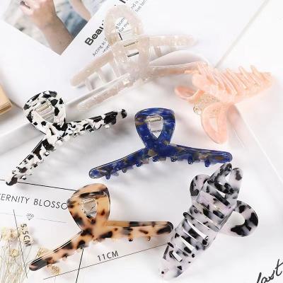 China Hairpin is hot selling European and American European and American style designer mermaid hairpin acetate head back cross clip hair door grab accessories for sale