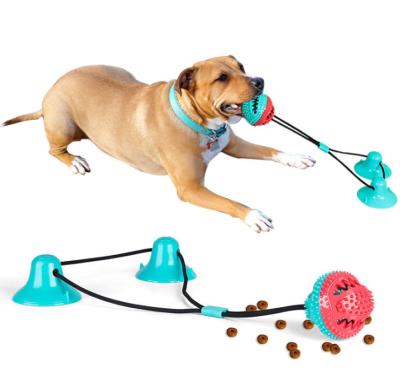 China Slow Food Pet Best Chewing Silicone Interactive Suction Cup Pet Suction Rubber Dog Teething Toys for sale