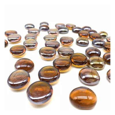 China Modern Flat Amber Light Color Frosted Glass Beads For Garden Decorating for sale