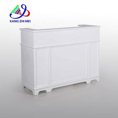 China Luxury Modern Convertible Front Reception Desk Counter Table High Gloss White Wood Beauty Salon Furniture for sale