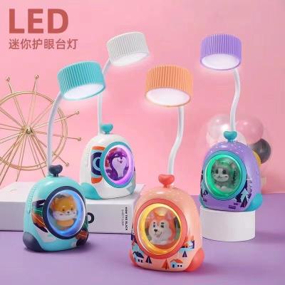 China Industrial cartoon eye protection desk lamp bedroom student reading lamp multifunctional rechargeable rechargeable study desk lamp. for sale