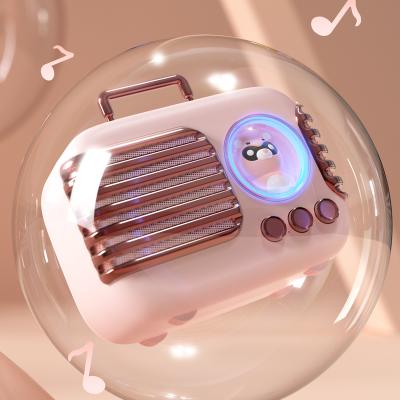 China DW09 Meng outdoor portable charging wireless subwoofer pet suitcase plastic cute mini speaker creative speaker for sale