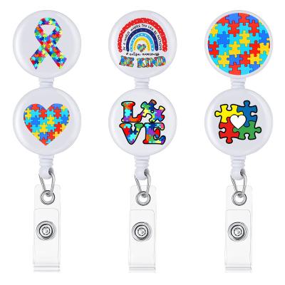 China Retractable Id Card Badge Holder ABS Epoxy Cartoon Color Puzzle Badge Holder Rainbow Ribbon Round Nurse Reel ID Badge for sale