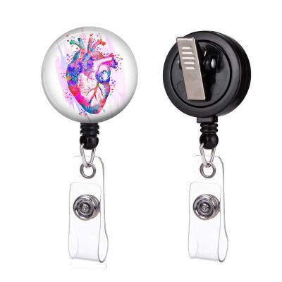 China New Arrivals Heart ID Card Badge Holder Retractable Custom Colored Epoxy Plastic Doctor Plastic Plastic Reel Holder Human Organ ID Badge Reel Holder alligator cli for sale