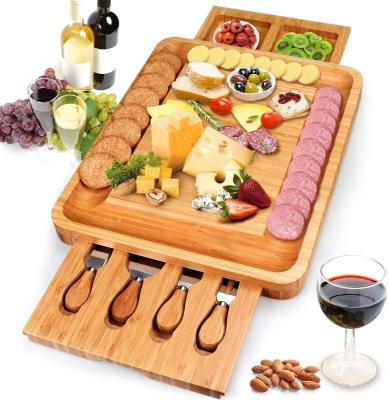 China Wholesale Disposable Bamboo Cheese Cutting Board Set With 4 Removable And 2 Stainless Steel Knife Drawers for sale