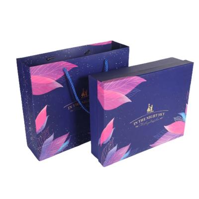 China Recycled Luxury Custom Printed Materials Gift Paper Box Logo Jewelry Packaging Shopping Paper Bag With Ribbon Handles for sale