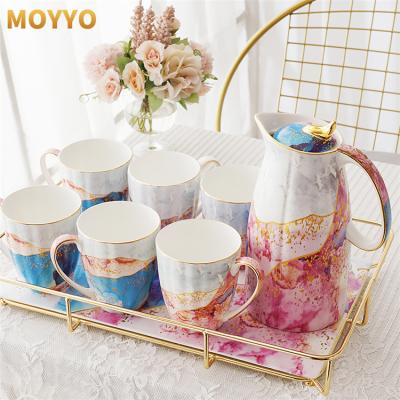 China Luxury Morden Heat Resistance Ceramic Water Kettle Tea Water Pot With Stand for sale