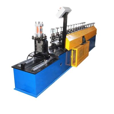 China NEW Type Top Cap Ceiling Batten Hotels Roll Forming Machine for sale