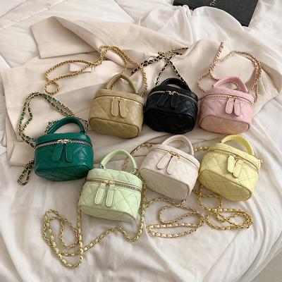 China New texture bag SXCCYH waterproof children's leisure mini bucket bag parent-child chain small perfume messenger mouth bag red envelope for sale