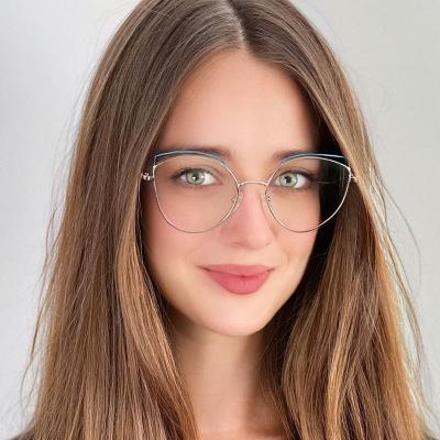 China Casual Time Hot Sale Hollow Out Small Cat Eye Eyewear Metal High Sight Pointed Cat Eyes Female Eyeglasses Anti Blue Light for sale