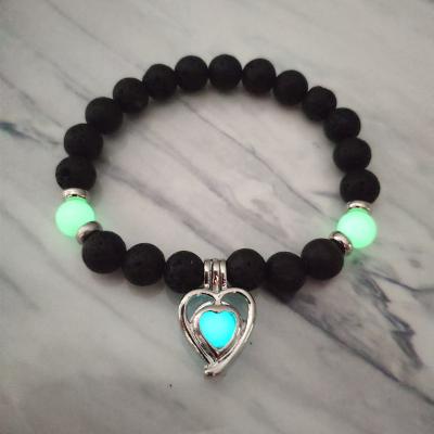 China High Quality/Factory Source Luminous Elastic String Beaded Natural Stone Jewelry Lava Volcanic Stone Heart Pendant Bangle Bracelet for sale