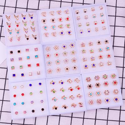 China Babies 8Pairs/Box Cute Crown Hypoallergenic Korean Wild Flower Star Pentagon Personality Temperament Plastic Needle Stud Earrings Set for sale