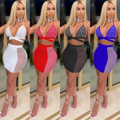 China 2022 Breathable Modern Skirts And Lady Two-Piece Sleeveless Top Cami Nightclub Skirt Backless Crop Custom Logo Solid Color Women Sets for sale