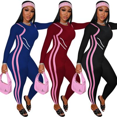 China 2022 QUICK DRY Hot Selling Long Sleeve Drop Printing Women's Jumpsuits Sports Round Neck Solid Color Slim Overalls Rompers One Piece Clothes for sale