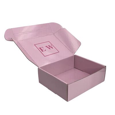 China Custom Recycled Folding Corrugated Mailing Cardboard Pink Clothing Packaging Materials Mailing Box for sale