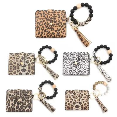 China Leopard Printing Carbon Fiber Waterproof Card Short Thin Short Card Holder Blocking Wristlet Key Chain Women's Credit Card Wristlet Purse Wallet Bag for sale