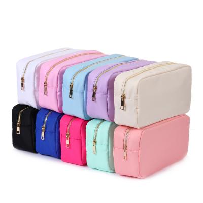 China Fashion Portable Fold Makeup Bag Nylon Toiletries Waterproof Women Cosmetic Bags for sale