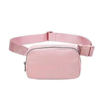 China Custom Logo Solid Color Cute Mini Fanny Pack Water Proof Crossbody Travel Running Increasing Waist Belt Adjustable Bag For Men for sale