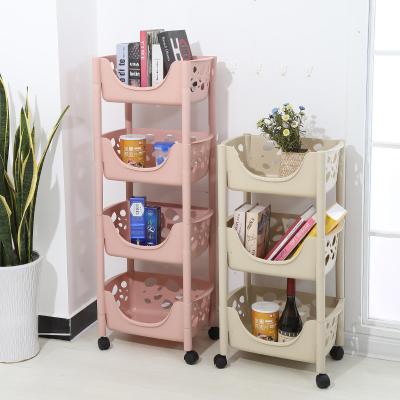 China Movable Minimalist Plastic 4 Tier Rack Rack Storage Shelf With Wheel Kitchen Fruit Vegetable Display Stands for sale