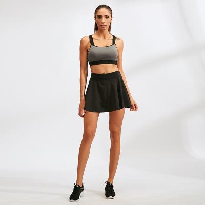 China Fashion Tennis Dance Yoga Training Anti-lighting Breathable Fitness Striping Ladies Sports Short Skirt for sale