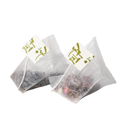 China Disposable Empty Nylon Pyramid Tea Bags With String And Tag for sale